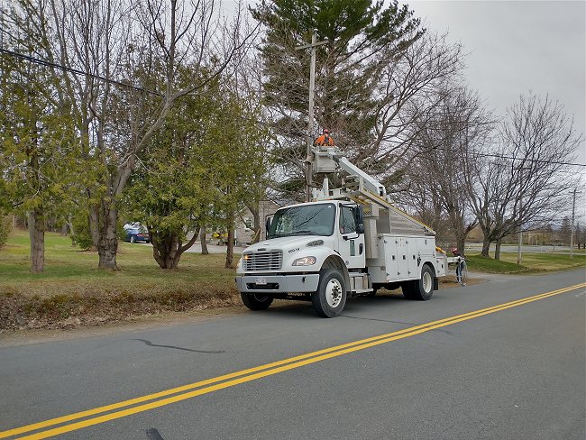 Power truck with bucket extended