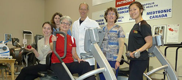 Health care professionals with workout equipment