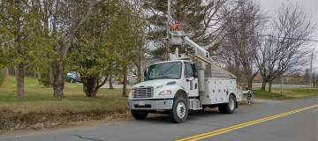 Power truck with bucket extended