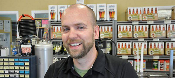 Man smiling at brewery